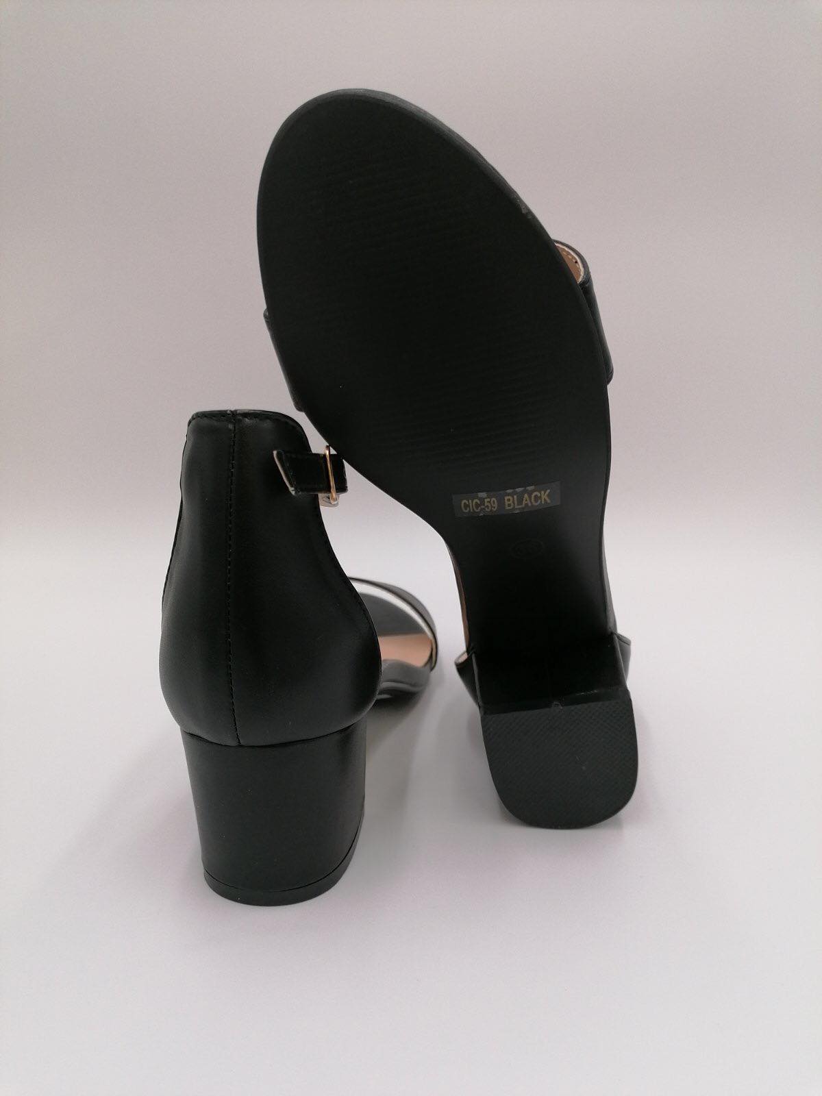 Elegant sort stilet med lav hæl